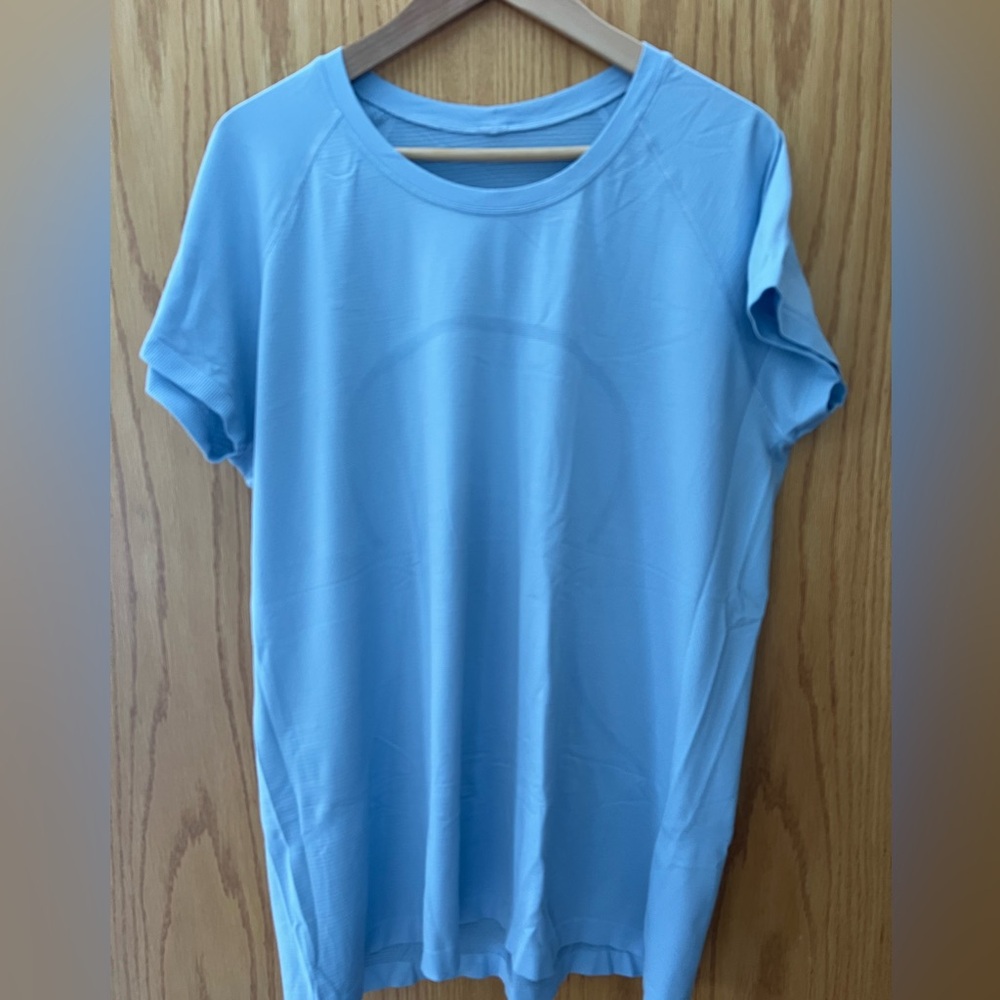 Swiftly Tech Short-Sleeve Shirt 2.0
Hip Length - Size 20